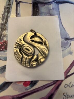 Frederick pewter Round Pendant with Carved Tribal Design
